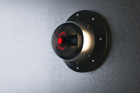 Close up of abstract round black cctv camera on concrete wall background Safety system and security 