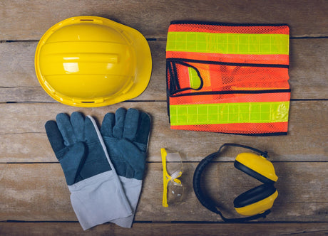 safety kit on wooden table 