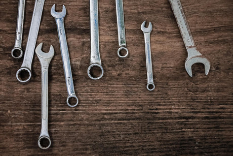Directly above shot of wrenches on table