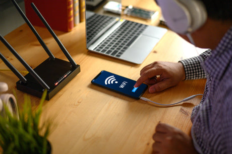 Young man Connecting router wifi On smartphone for Internet and social media