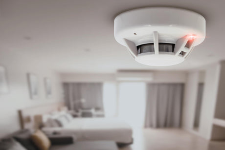Smoke detector fire alarm detector home safety device setup at home hotel room ceiling