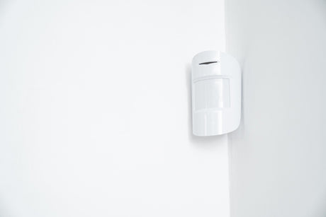 wireless motion sensor in white room