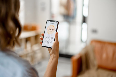 Smartphone with launched application for temperature adjustment
