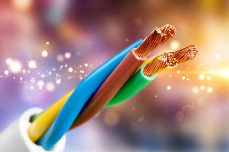 Four core armoured copper cable on background