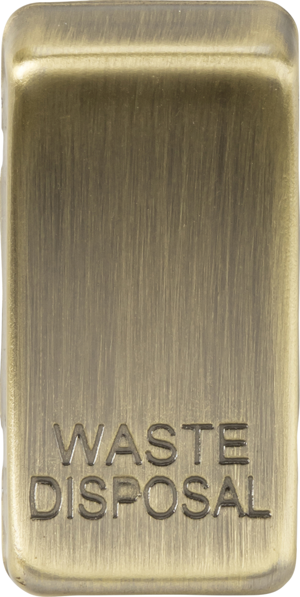 Antique Brass Switch Cover marked WASTE DISPOSAL